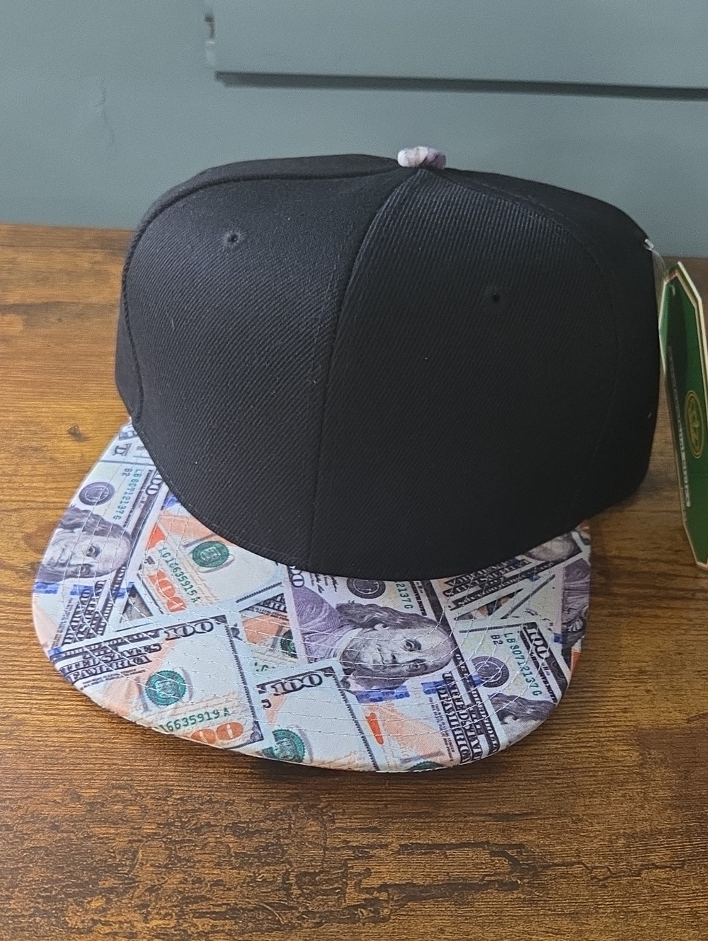 Black Snapback Hat with Money Print Brim